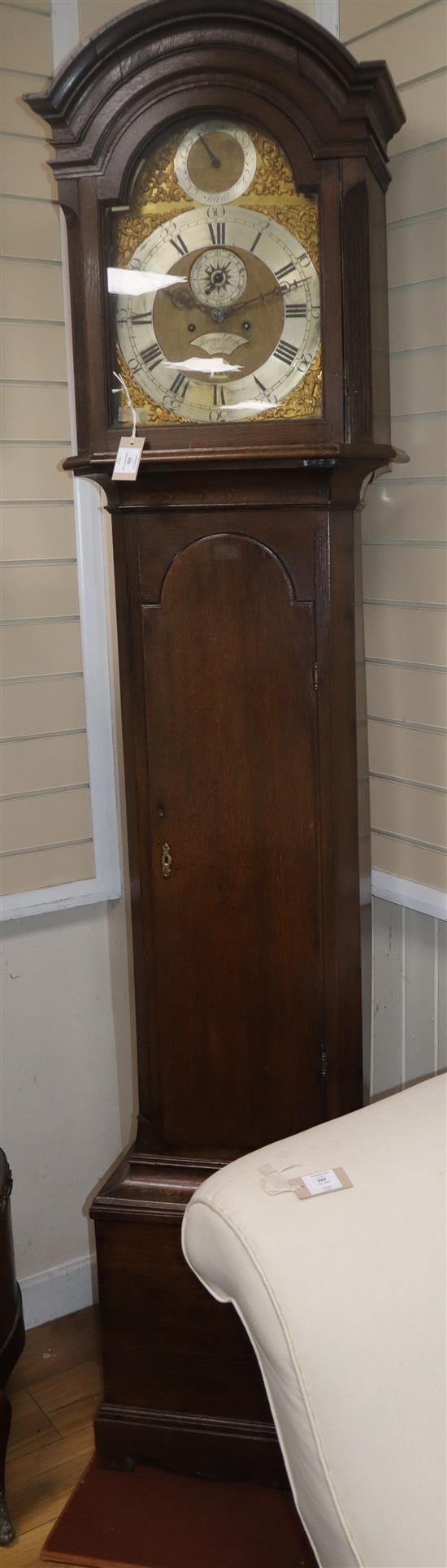 An early 19th century oak longcase clock by Thomas Brass, Guildford H.220cm